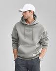 Sweat à capuche imprimé contrasté en peluche pour hommes