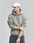 Sweat à capuche imprimé contrasté en peluche pour hommes