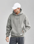 Sweat à capuche imprimé contrasté en peluche pour hommes