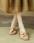 Chaussons à talons en peau de mouton FEMME