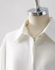 Women’s White Half-Sleeve Polo Shirt – Minimalist Niche Button-Up Top