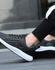 Mesh flying woven breathable shoes men