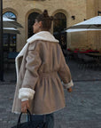 Imitation leather Coat / jacket Women