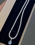 Woman's Natural Pearl & 2ct Moissanite Necklace